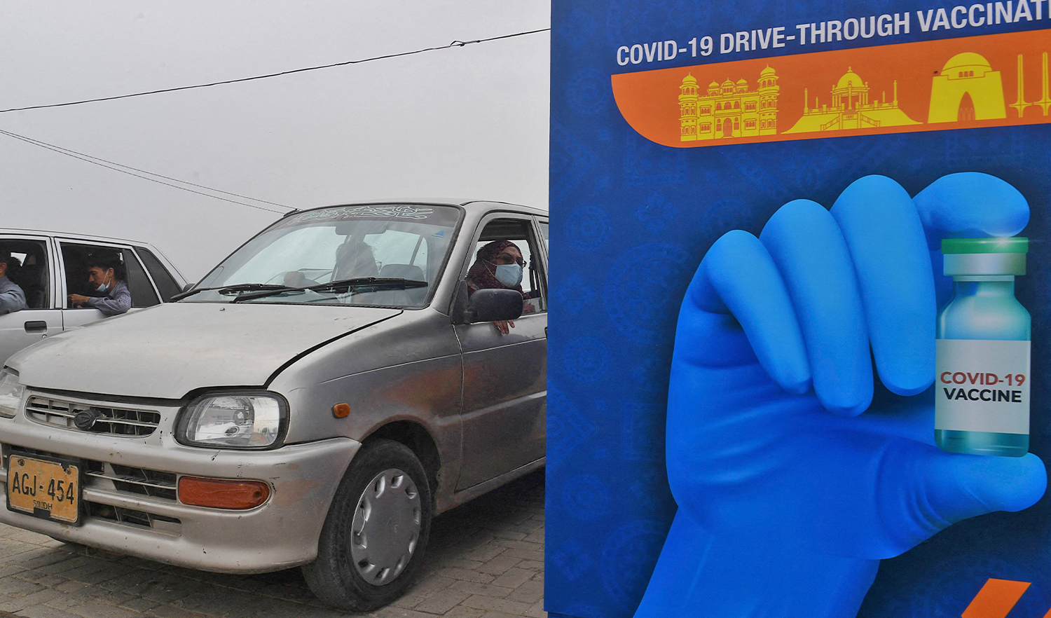 A woman awaits to receive a dose of the Sinopharm vaccine against the coronavirus, during a drive-through vaccination in Karachi on July 26, 2021. (AFP/File)