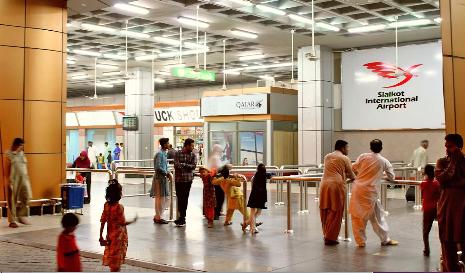 People stand by an exit at Sialkot International Airport in Sialkot, Pakistan, on November 5, 2017. (Photo courtesy: Online)