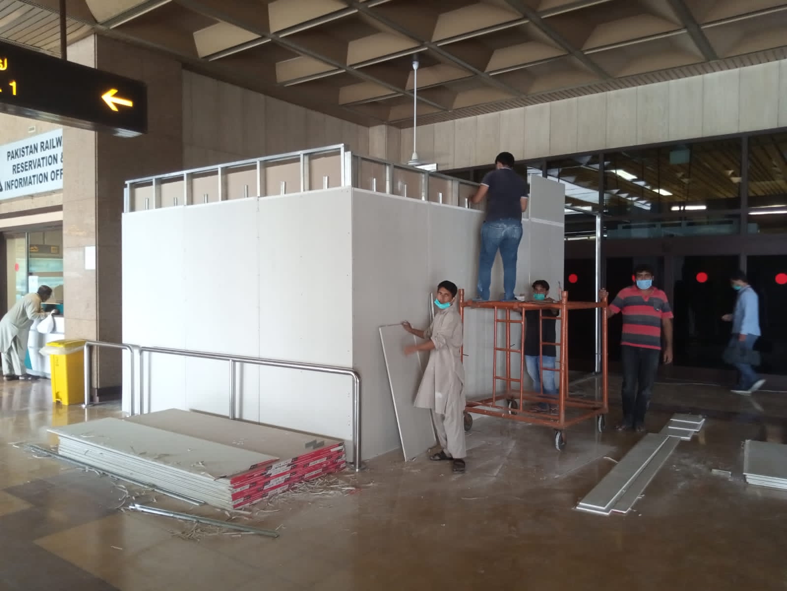 Work underway to make counters for rapid PCR testing at Karachi’s Jinnah International Airport on Thursday, August 12, 2021. (Photo courtesy: Dr Farhan Essa)