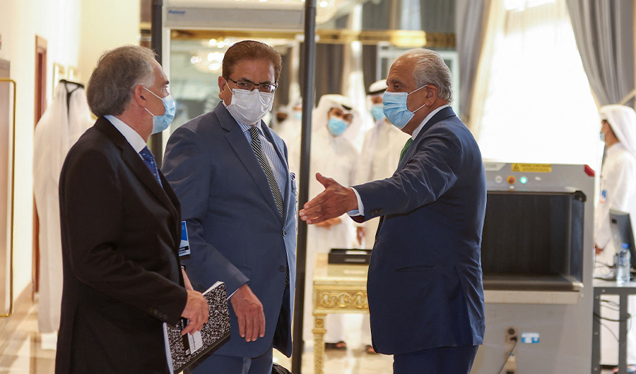 (L to R) UNSC'S personal envoy on Afghanistan Jean Arnault, Pakistan's Special Representative for Afghanistan Mohammad Sadiq (L), and US special envoy for Afghanistan Zalmay Khalilzad (C), talk at a in Qatar's capital Doha, August 10, 2021. (AFP)