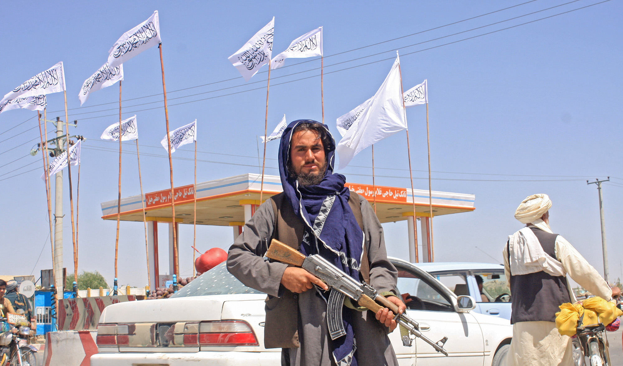 A Taliban fighter looks on as he stands at the city of Ghazni, Afghanistan, on August 14, 2021. (REUTERS)