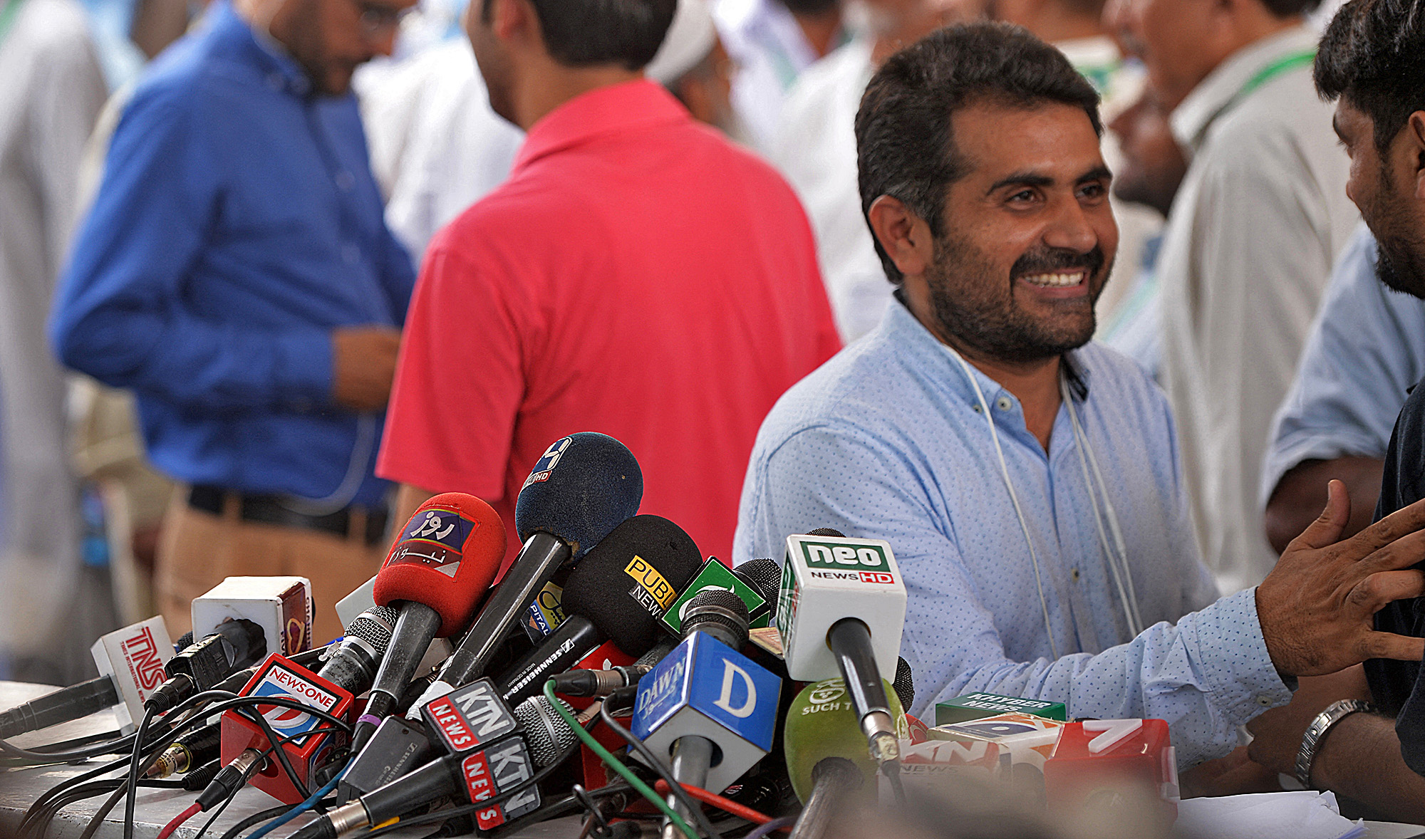 Pakistani journalists gather before a press conference outside the Supreme Court building, in Islamabad, Pakistan, on June 28, 2018. (AFP/File)