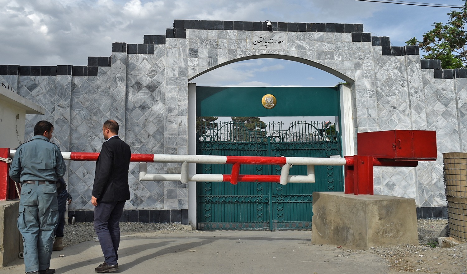 Afghan security personnel stand guard in front of the Pakistan embassy in Kabul on May 10, 2016. (AFP/File)