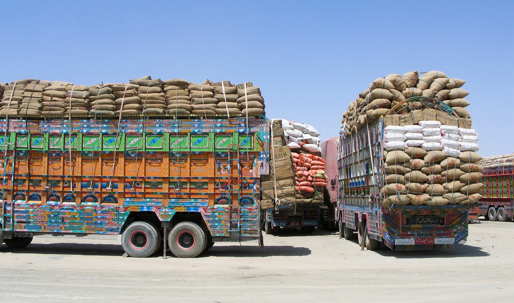 Trucks loaded with supplies wait to cross into Afghanistan at the Friendship Gate crossing point, in the Pakistan-Afghanistan border town of Chaman, Pakistan August 19, 2021. (REUTERS)