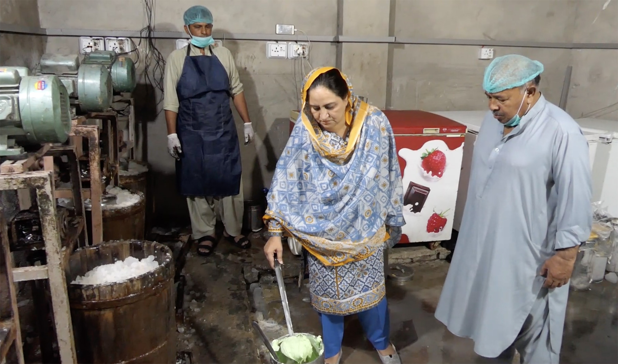 Ice cream business owner Lubna Farooq checks ice cream at her factory in Quetta, Pakistan on August 13, 2021. (AN photo)