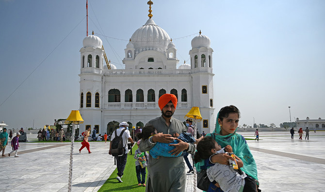 Sikh pilgrims arrive to take part in a religious ritual on the occasion of the 481st death anniversary of Baba Guru Nanak Dev Ji, the founder of Sikhism, at the Gurdwara Darbar Sahib in Kartarpur near the India-Pakistan border on September 22, 2020. (AFP/File)