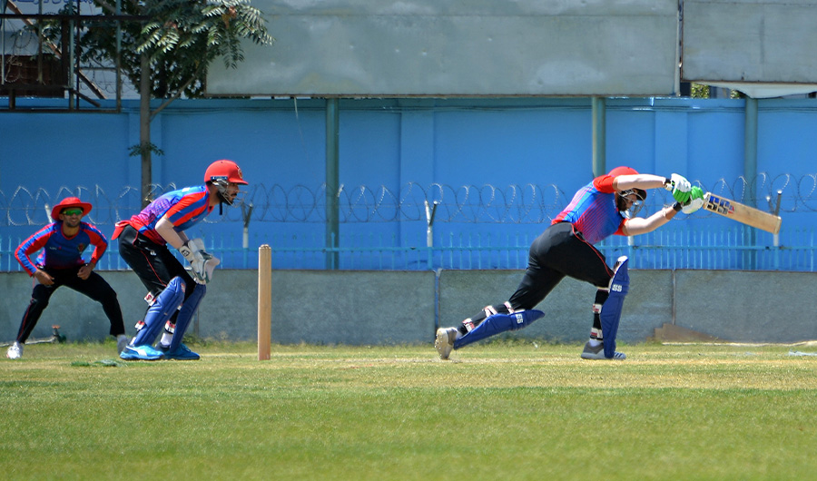 Afghanistan's national cricket team players attend a training session at the Kabul International Cricket Ground in Kabul on August 21, 2021. (AFP)