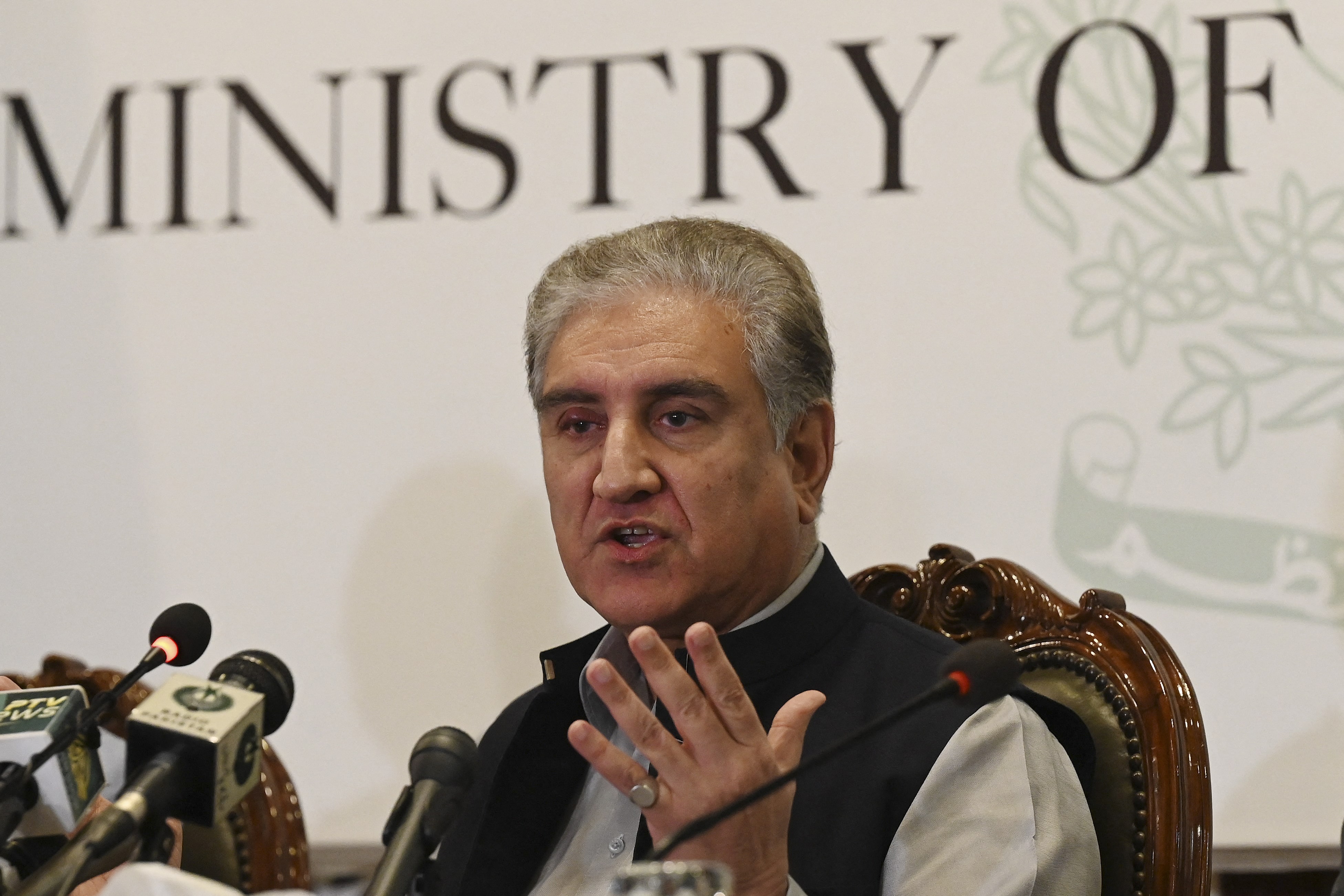 Pakistan's Foreign Minister Shah Mahmood Qureshi speaks during a press conference over the ongoing situation in Afghanistan, at the Foreign Ministry in Islamabad on August 9, 2021. (AFP)