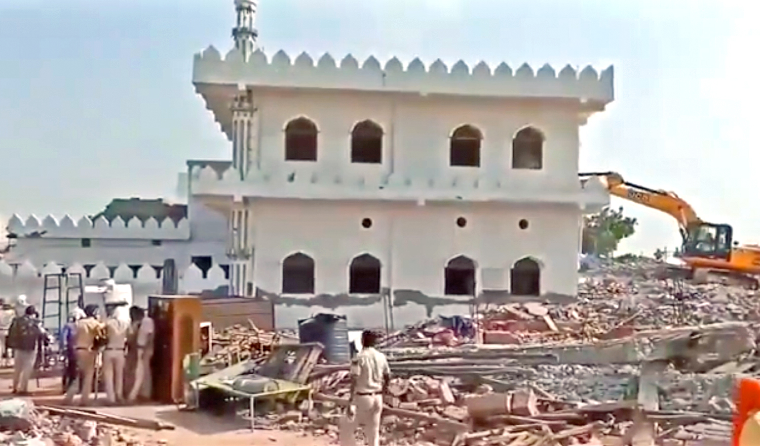 The screen grab shows heavy machinery tearing down an ancient mosque in the Indian state of Haryana, earlier this week. (Photo courtesy: Social media)