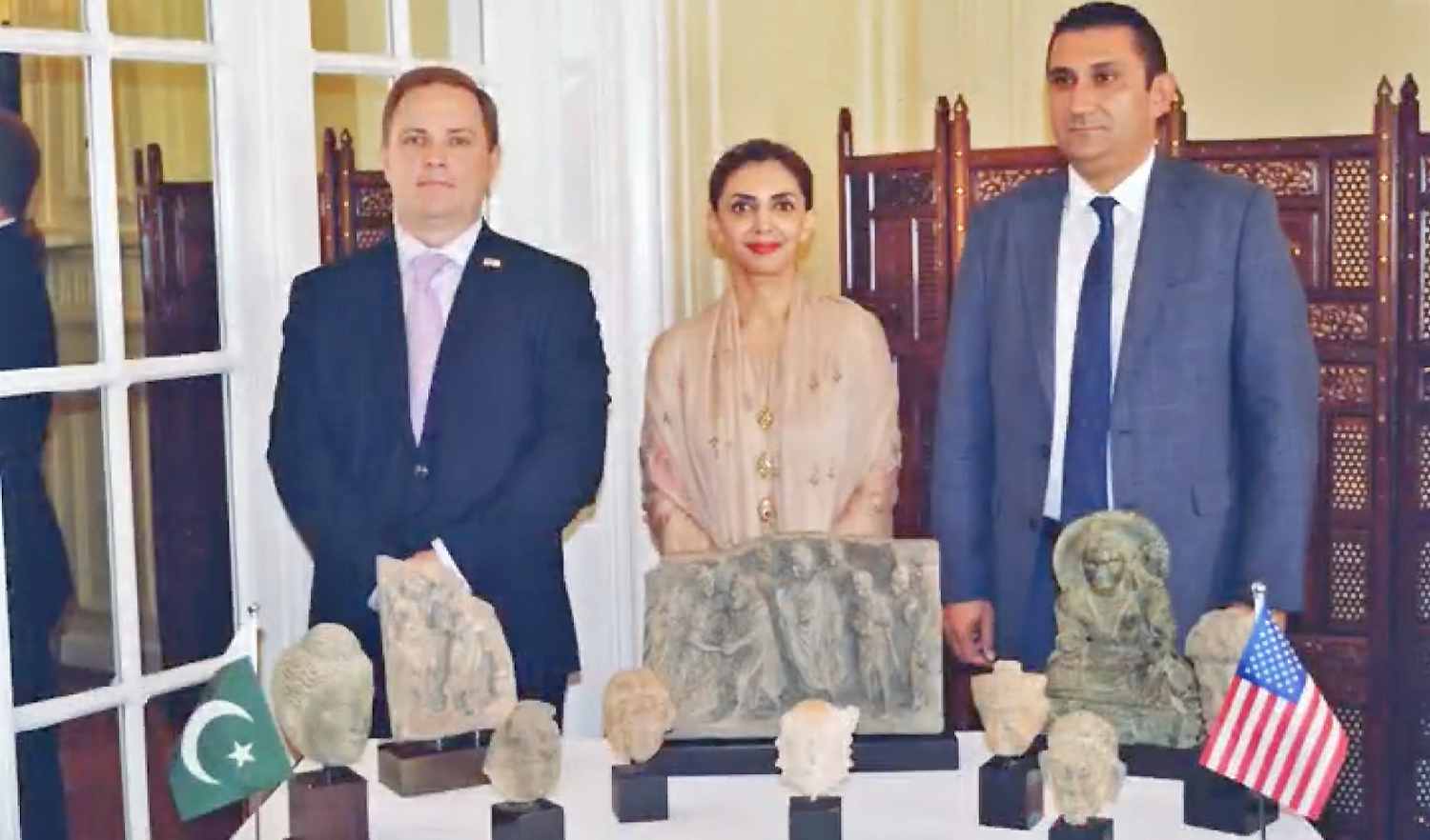 Pakistani diplomats and US Homeland Security official pose for picture at handover ceremony of stolen Pakistani antiquities in New York, US, on August 24, 2021. (Photo courtesy: Pakistan Consulate General New York)
