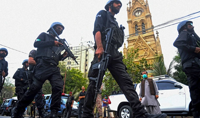 Police commandos patrol near the Pakistan Stock Exchange building in Karachi on June 29, 2020. (AFP/File)