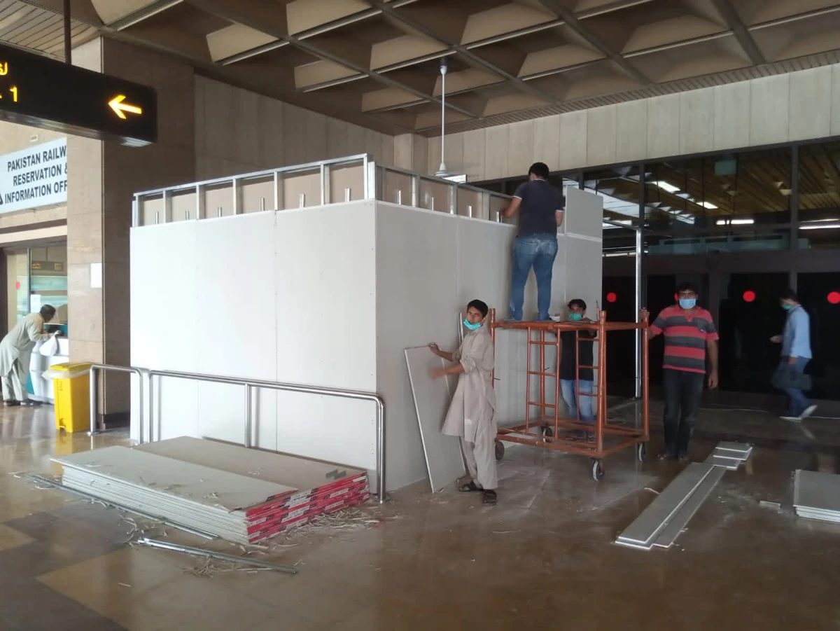 Work underway to make counters for rapid PCR testing at Karachi’s Jinnah International Airport on Thursday, August 12, 2021. (Photo courtesy: Dr Farhan Essa)