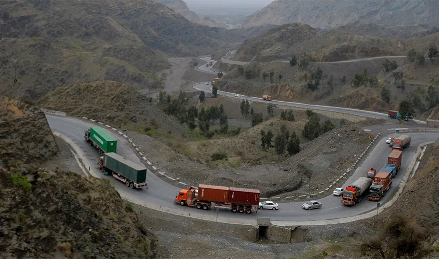 Trucks carry goods on its way to neighboring Afghanistan through the Khyber Pass in Pakistani tribal area, Tuesday, March 21, 2017. (AP)