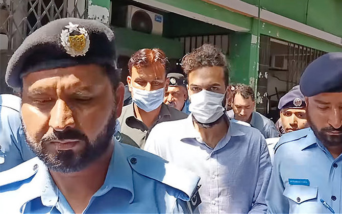 Zahir Zakir Jaffer (second right), main suspect in the July 20 murder of Noor Mukadam, is led by Islamabad police officers to the court in Islamabad, Pakistan, on August 2, 2021. (Photo courtesy: Social Media)