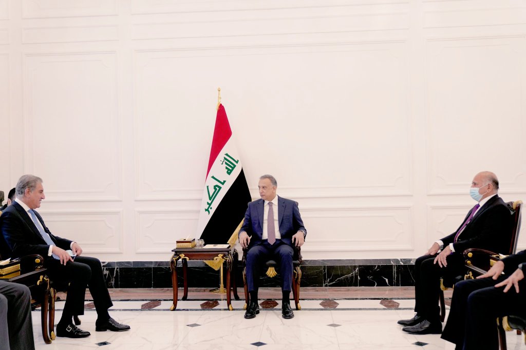 Pakistan's Foreign Minister Shah Mahmood Qureshi (L) meets Iraqi Prime Minister Mustafa Al-Kadhimi (C), in Islamabad, Pakistan on May 29, 2021. (Photo courtesy: FM Qureshi Twitter/File)