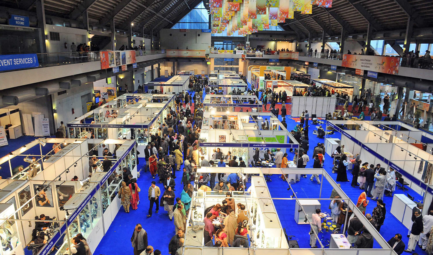 Visitors are seen on the showroom floor during the Expo-Trade fair in Lahore, Pakistan, on February 13, 2012. (AFP/File)