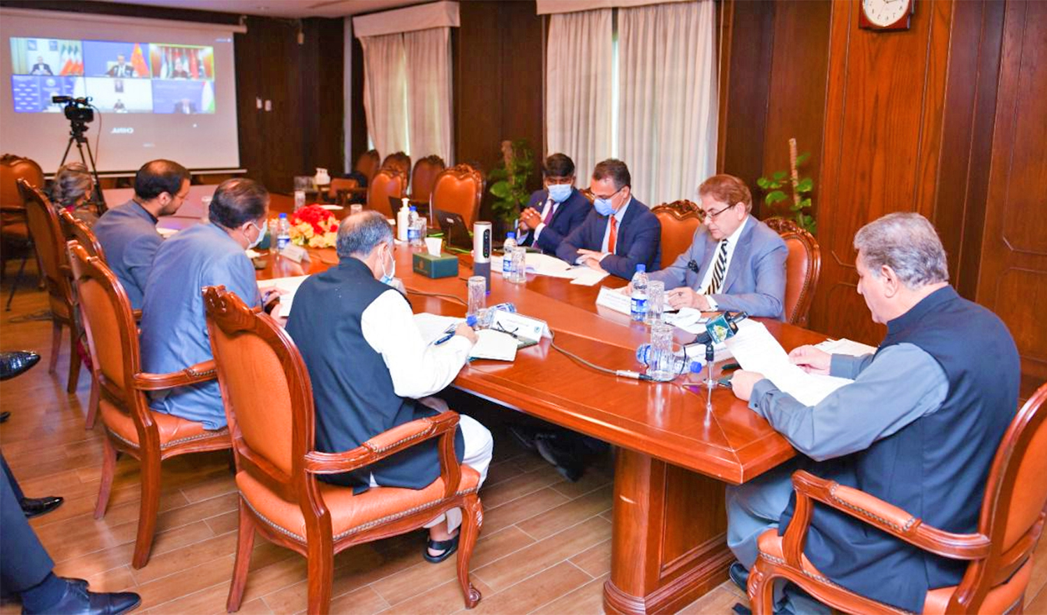 Pakistan's Foreign Minister, Shah Mahmood Qureshi (first right) hosts a virtual meeting of regional foreign ministers in Islamabad, Pakistan, on September 8, 2021. (Photo courtesy: @SMQureshiPTI/Twitter)
