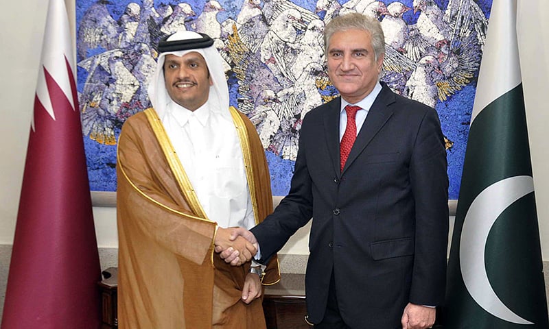 Pakistan's Foreign Minister Shah Mahmood Qureshi shakes hand with his Qatari counterpart Sheikh Mohammed bin Abdulrahman Al-Thani in Islamabad on October 19, 2018. (Photo courtesy: APP)