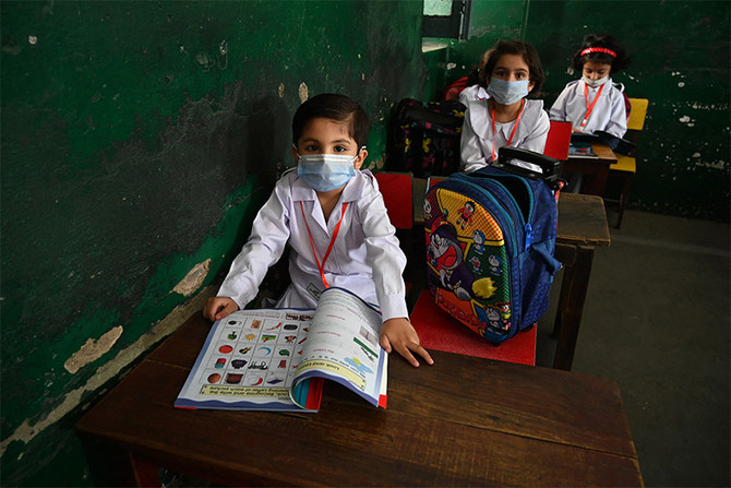 Students attend their class at a school in Rawalpindi, Pakistan, on June 7, 2021. (AFP)