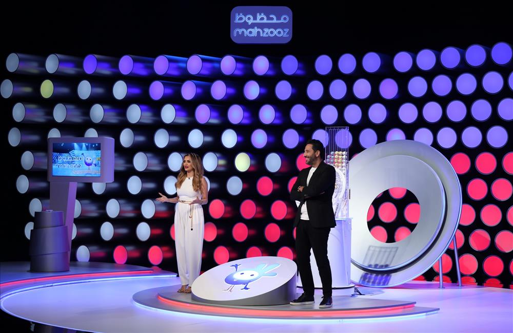 The TV set and hosts of Mahzooz, a weekly live draw in Dubai, United Arab Emirates that offers players an opportunity to win tens of millions of dirhams. (Photo courtesy: Mahzooz)