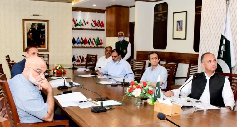 Minister of Economic Affairs Omar Ayub Khan holds a virtual meeting with Eng. Hani Saleem Sonbol, CEO, International Islamic Trade Finance Corporation (ITFC) on September 13, 2021. (PID Photo)