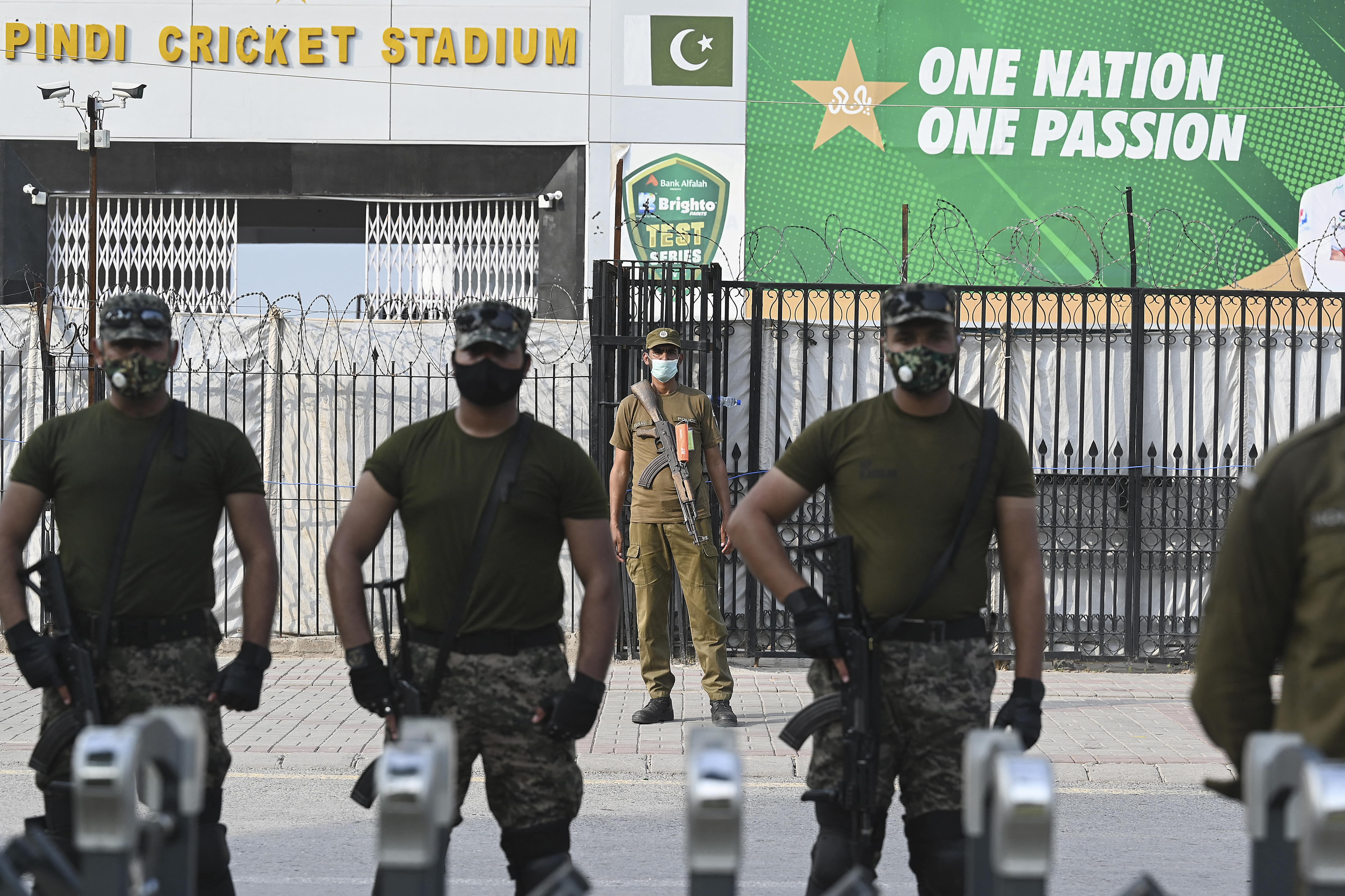 Paramilitary soldiers stand guard outside the Rawalpindi Cricket Stadium in Rawalpindi on September 17, 2021. (AFP)