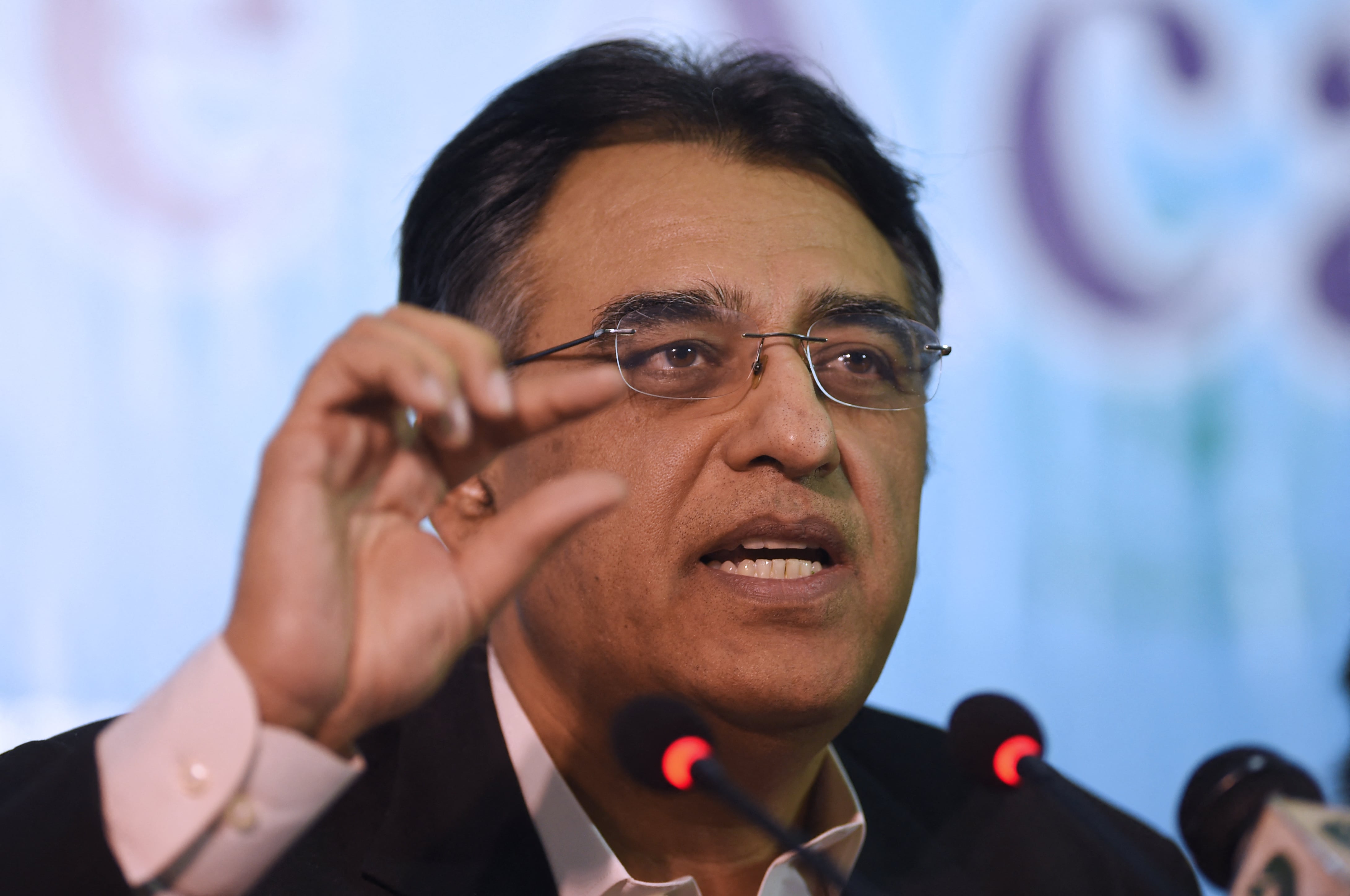 Pakistan Minister for Finance Asad Umar speaks during a press conference in Islamabad on November 30, 2018. (AFP)