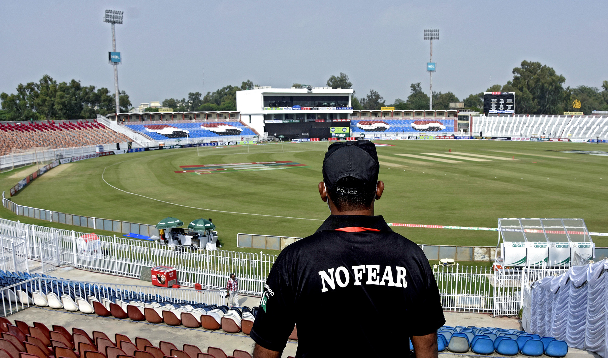 A member of the Police Elite Force stands guard at the Rawalpindi Cricket Stadium, after the New Zealand cricket team pulled out of a Pakistan cricket tour over security concerns, in Rawalpindi, Pakistan September 17, 2021. (REUTERS)
