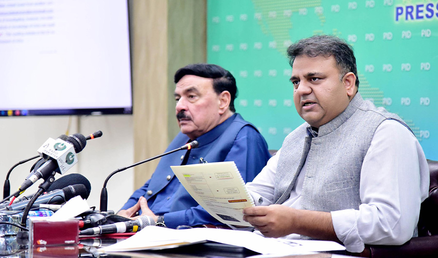 Pakistan Information Minister Fawad Chaudhry (right) and Interior Minister Sheikh Rashid Ahmed (left) speak to media in Islamabad on September 22, 2021. (Photo courtesy: PID)