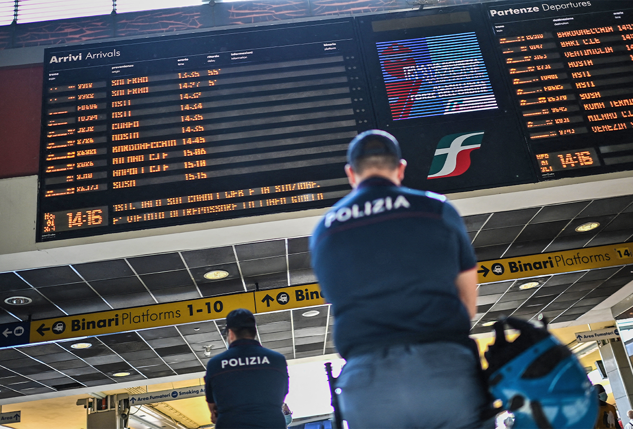 Police officers patrol the Porta Nuova railway station in Turin, Italy, on September 1, 2021. (AFP/File)