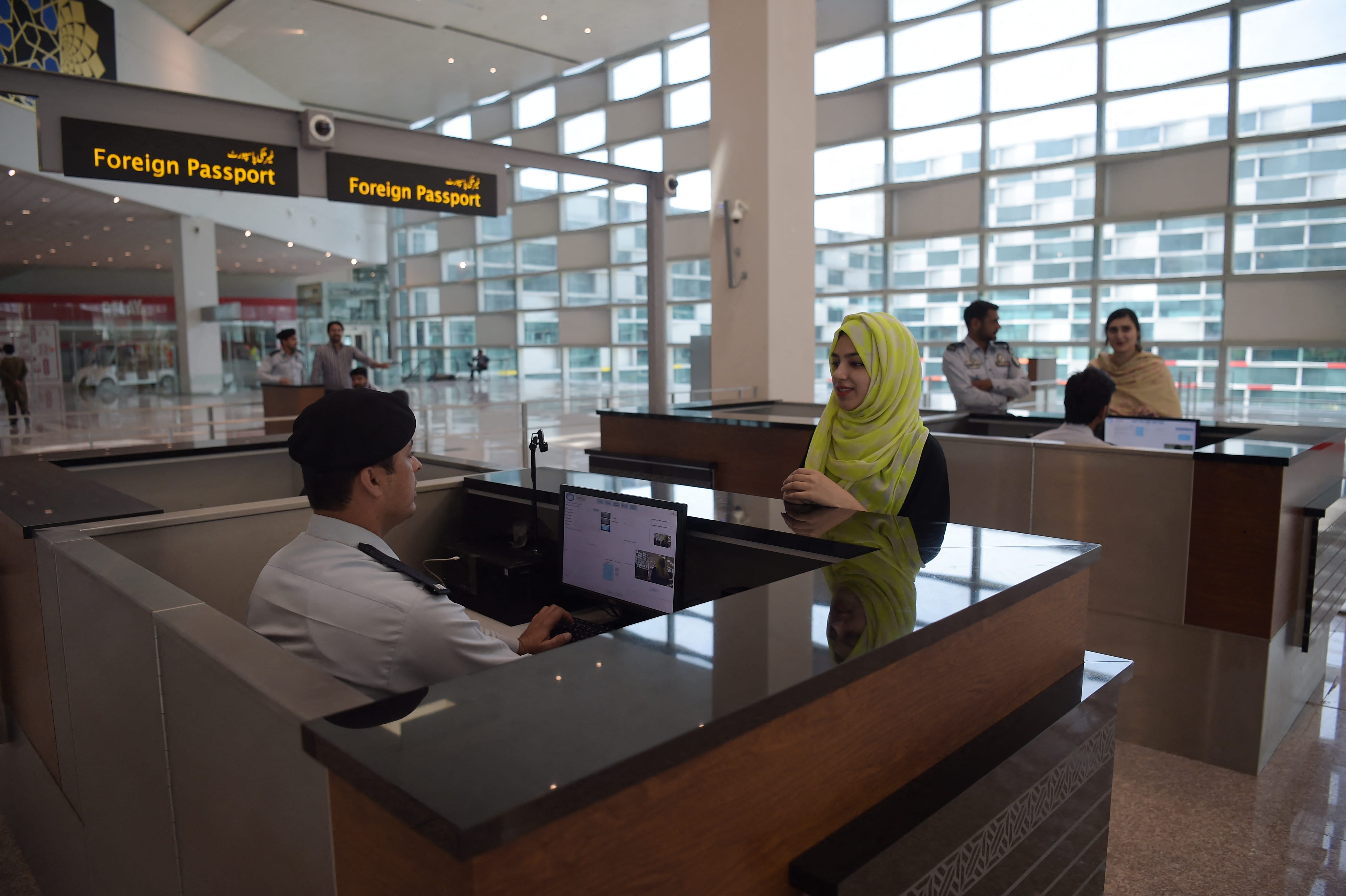 Pakistani officials take part in a rehearsal by the airport officials at the newly built Islamabad International Airport ahead of its official opening on the outskirts of Islamabad on April 26, 2018. (AFP/ File)