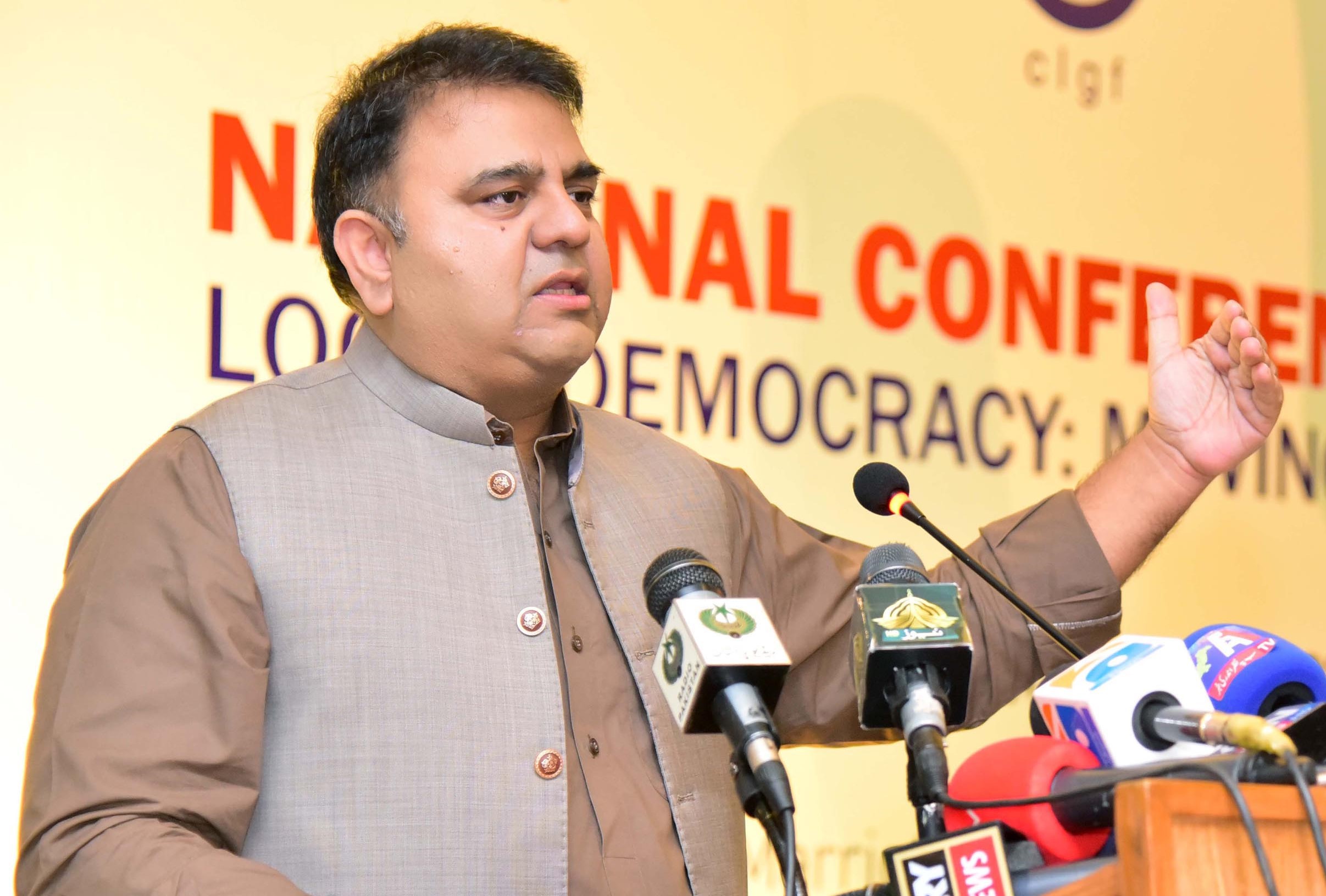 Pakistani information minister Chaudhry Fawad Hussain addressing a national conference on "Local Democracy and Moving Forward" in Islamabad, Pakistan on Sept. 28, 2021. (PID Photo)