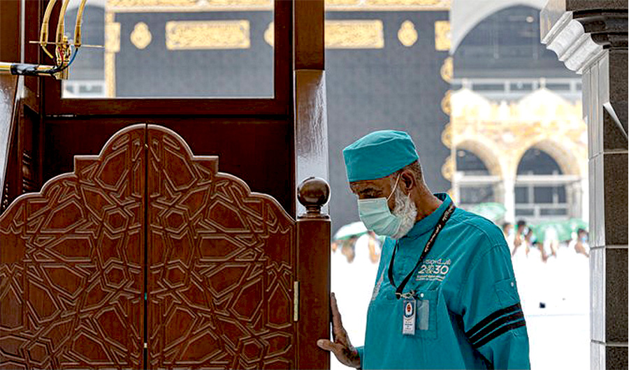 In this undated photo, Pakistani worker Ahmed Khan performs his duties at the Grand Mosque in Makkah, Saudi Arabia. (Photo courtesy: Ahmed Khan)