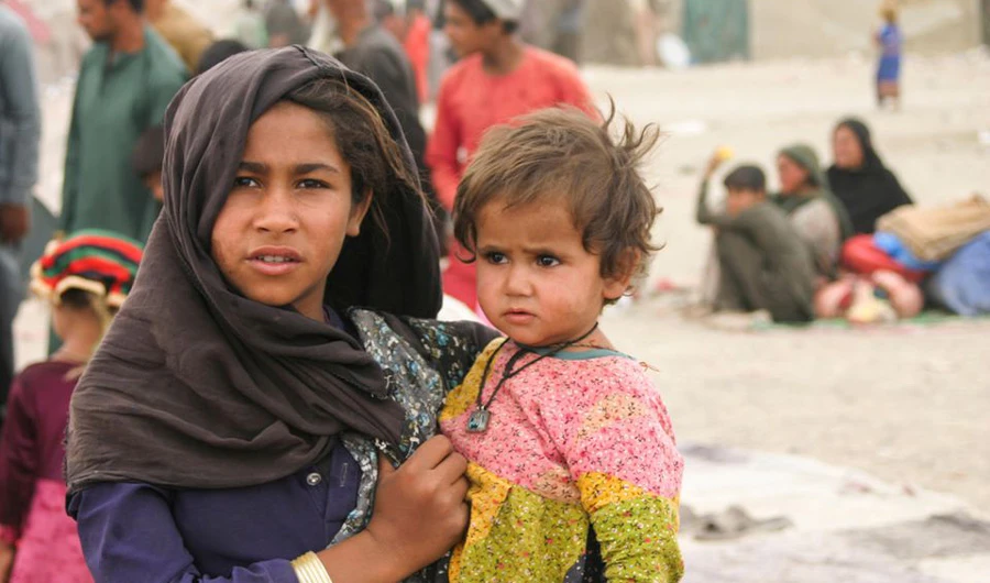 Siblings who arrived from Afghanistan with their families are seen at their makeshift tents as they take refuge near a railway station in Chaman, Pakistan September 1, 2021. (REUTERS)