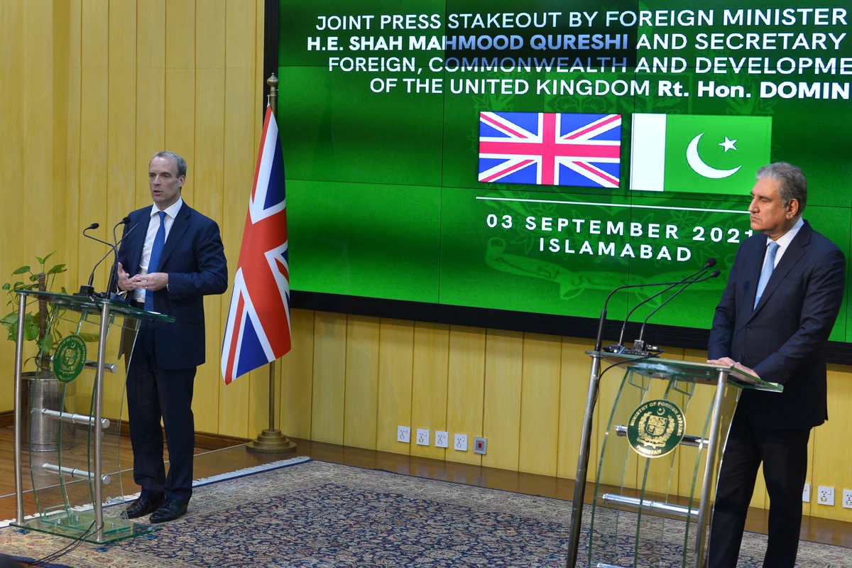 Britain's Foreign Secretary Dominic Raab (L) speaks during a press conference as Pakistan’s Foreign Minister Shah Mahmood Qureshi watches after their meeting in Islamabad on September 3, 2021. (AFP)