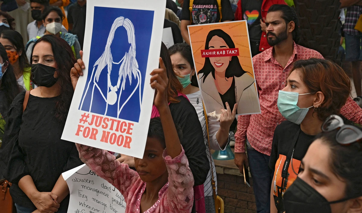 Women rights activists hold placards during a demonstration in Lahore on July 24, 2021, against the brutal killing of Noor Mukadam in Islamabad. (AFP/File)