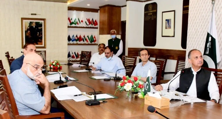 Minister of Economic Affairs Omar Ayub Khan holds a virtual meeting with Eng. Hani Saleem Sonbol, CEO, International Islamic Trade Finance Corporation (ITFC) on September 13, 2021. (PID Photo)