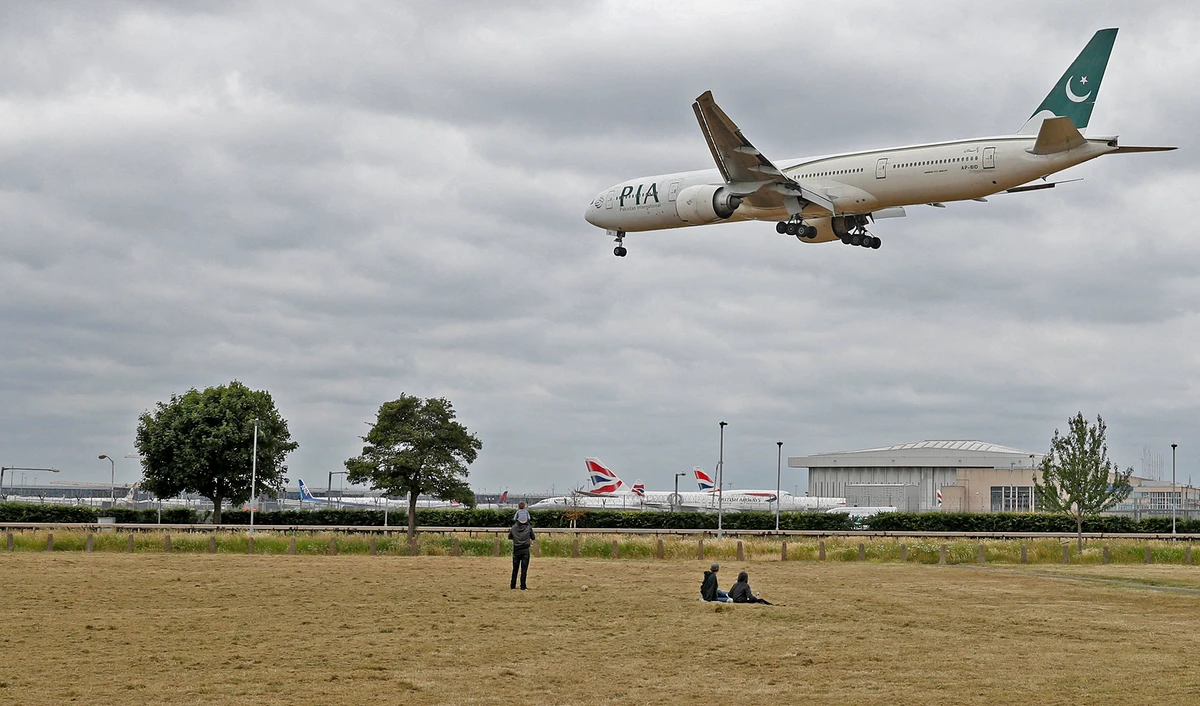 A Pakistan International Airlines Boeing 777 comes in to land at Heathrow airport in west London on June 8, 2020. (AFP/File)