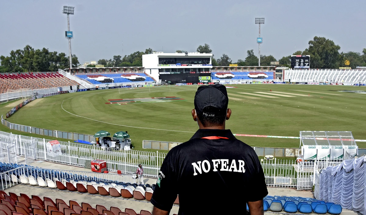 A member of the Police Elite Force stands guard at the Rawalpindi Cricket Stadium, after the New Zealand cricket team pulled out of a Pakistan cricket tour over security concerns, in Rawalpindi, Pakistan September 17, 2021. (REUTERS)