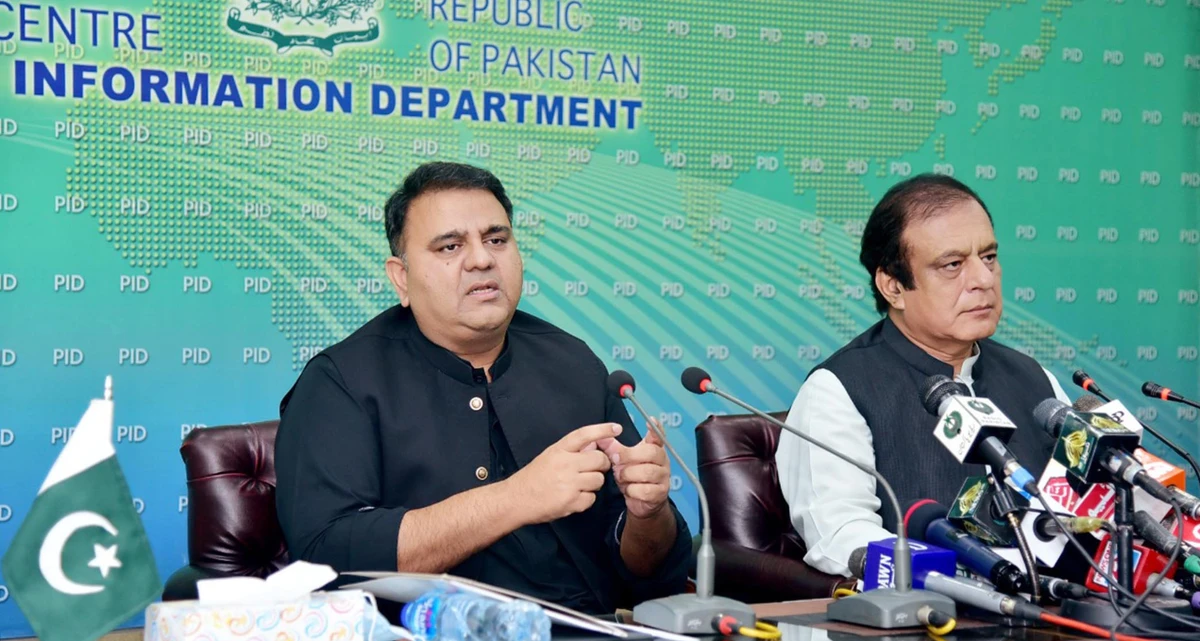 Information Minister Fawad Chaudhry (L) and senator Shibli Faraz (R), Federal Minister for Science and Technology addressing a press conference in Islamabad, Pakistan on Sept. 19, 2021. (PID Photo)