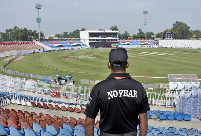 A Pakistani security forces personnel is seen in the cricket stadium following the cancellation of cricket series between Pakistan and New Zealand, in Rawalpindi, Pakistan, on September 17, 2021. (AP)
