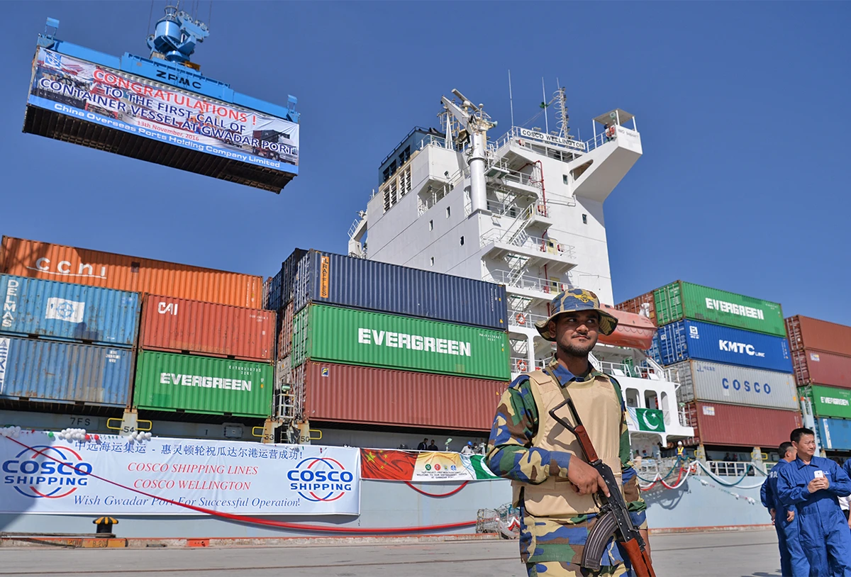 Pakistani Naval personnel stand guard near a ship carrying containers at the Gwadar port, Pakistan, on November 13, 2016. (AFP/File)