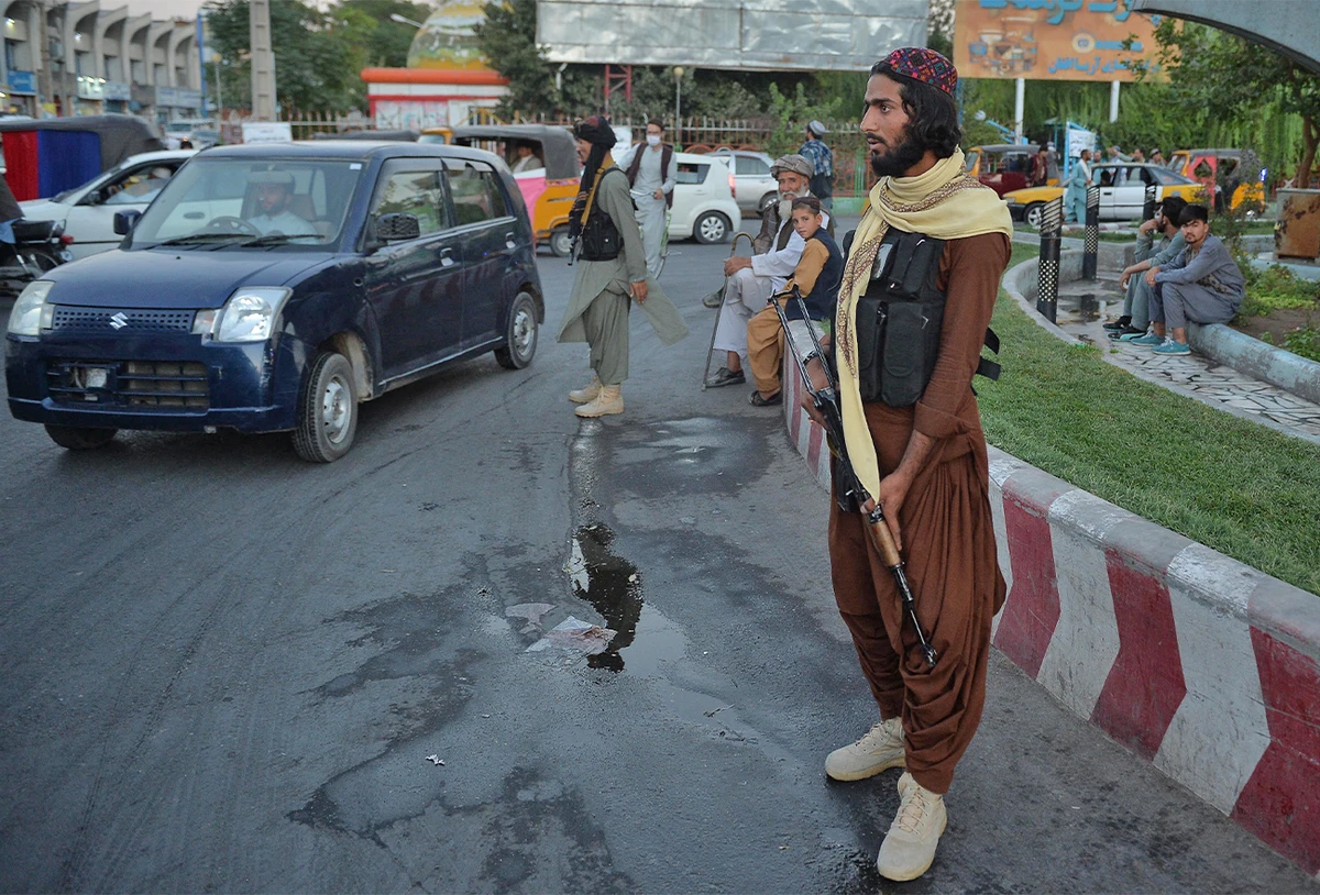 Taliban fighters stand guard along a road in Herat, Afghanistan, on September 21, 2021. (AFP/File)