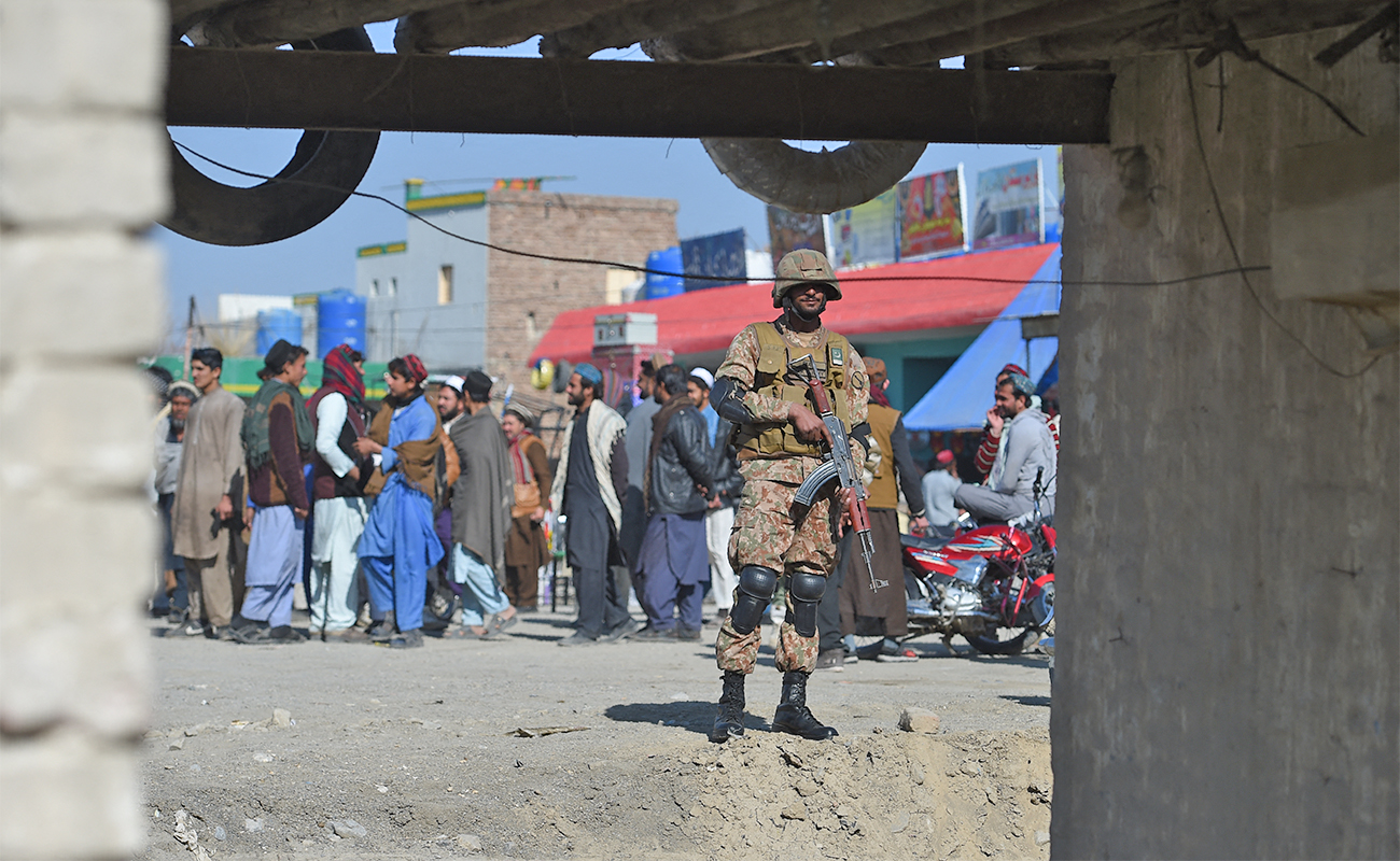 Pakistani army soldiers gather near a vehicle at a border terminal in North Waziristan, on the border between Pakistan and Afghanistan, on January 27, 2019. (AFP/File)