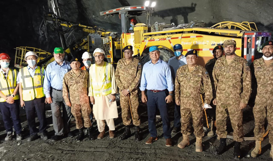 Chairman WAPDA Lt Gen Muzammil Hussain (Retd) (6th from right) and Commander 10 Corps Lt. Gen Sahir Shamshad Mirza (7th from right) photographed in Diversion Tunnel during their visit to Diamer Bhasha Dam Project on October 3, 2021. (WAPDA photo)