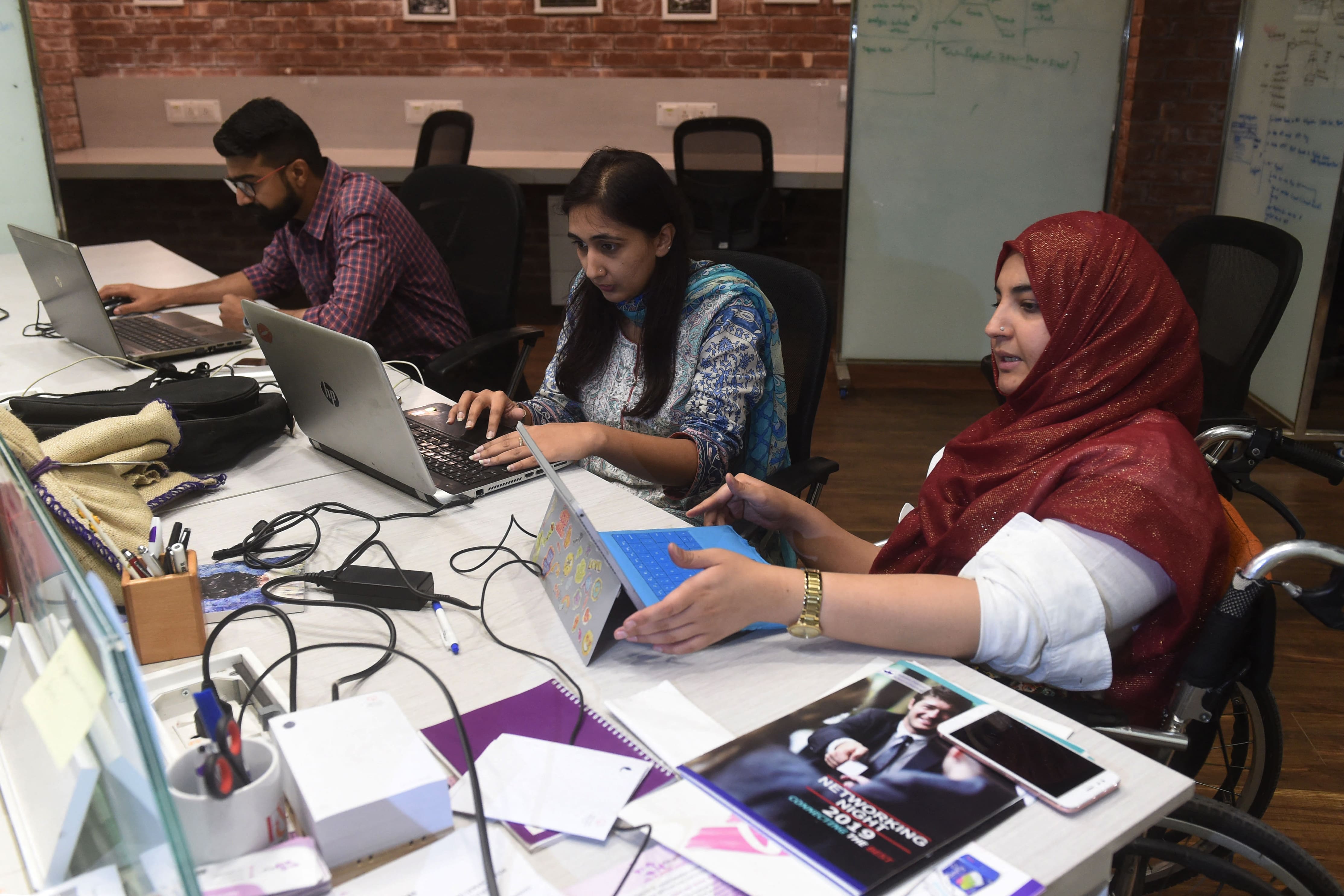 In this photograph taken on May 24, 2019, Tanzila Khan (R), founder of 'Girly Things', an application-based start-up, at the National Incubation Centre (NIC), a start-up incubator, in Lahore, Pakistan. (AFP/ File Photo)