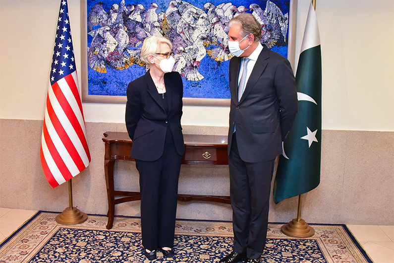 This handout photograph taken on October 8, 2021 and released by the Pakistan Foreign Office shows US Deputy Secretary of State Wendy Sherman (L) meeting with Pakistan's Foreign Minister Shah Mehmood Qureshi in Islamabad. (AFP)