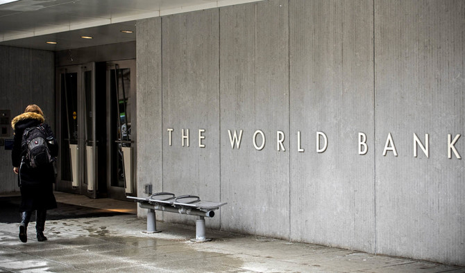In this file photo, a person enters the building of the Washington-based global development lender, The World Bank Group, in Washington on Jan. 17, 2019. (AFP)