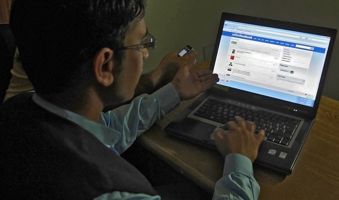 In this file photo, an IT professional browse s Facebook in Lahore on May 27, 2010. (AFP)