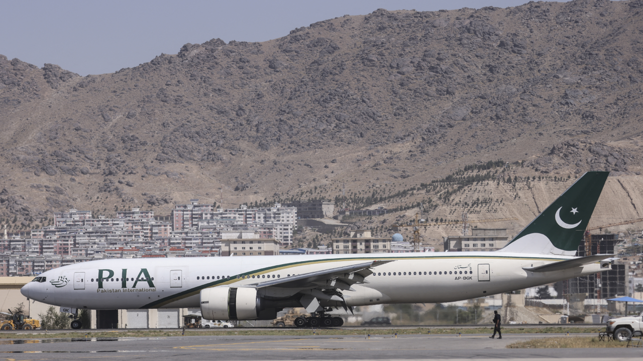 A Pakistan International Airlines plane is seen after landing at the airport in Kabul, on September 13, 2021. (AFP)